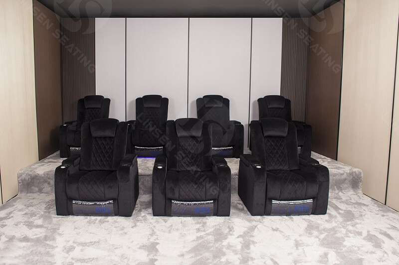 black fabric power theater chairs